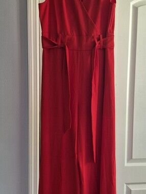 Large red jumpsuit with leg cutouts.